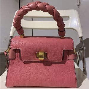 Pink miumiu handbag with straps